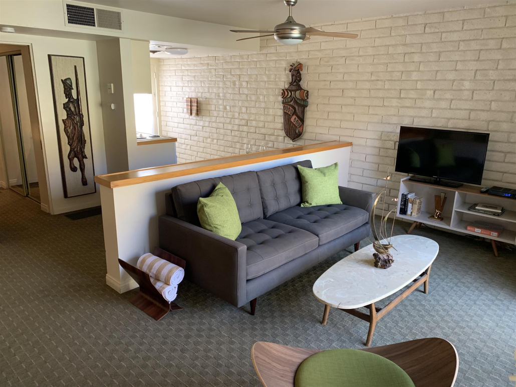 Mid-century modern furnishings inside the King Suite at Desert Hills Resort Hotel in Palm Springs, California