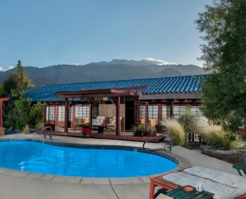 The back entrance of Sakura Bed & Breakfast opens up to the pool area with San Jacinto Mountain views