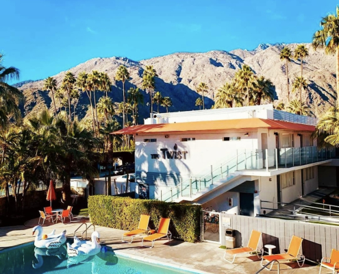 The pool at The Twist Palm Springs with the San Jacinto Mountains in the background