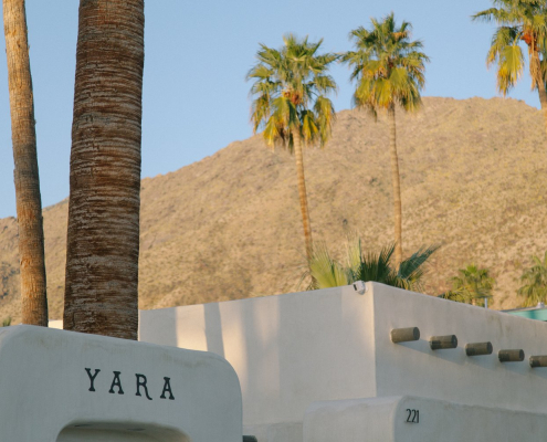 The white building welcoming guests to the Yara Hotel in Palm Springs, California