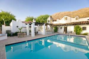 The San Jacinto Mountains behind the sparkling pool at The Lucille Palm Springs