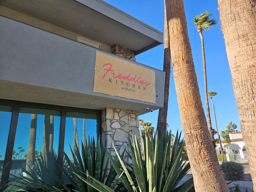 A sign reading "Freddy's" outside of the restaurant at The Cole in Palm Springs, California