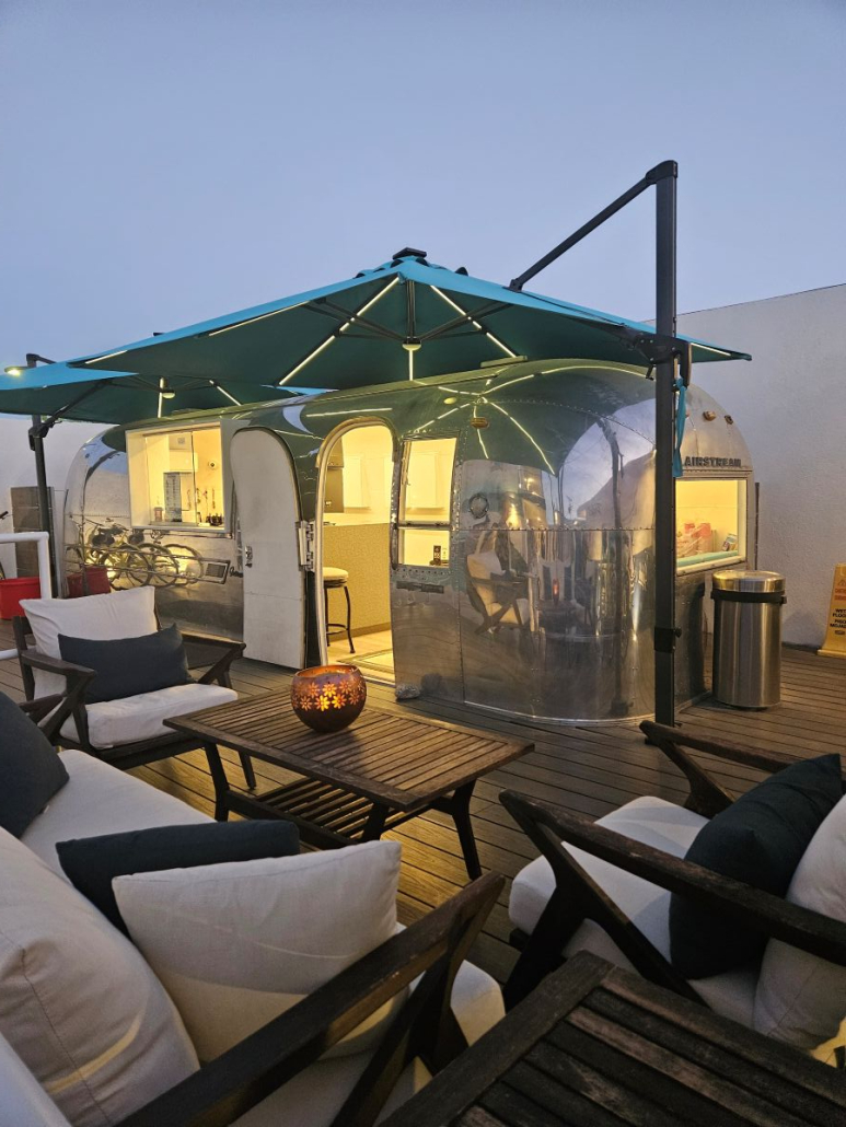 An Airstream trailer at Skylark Hotel Palm Springs used as a registration desk