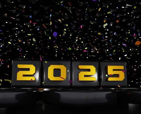 Gold 2025 numbers in front of a colorful confetti background