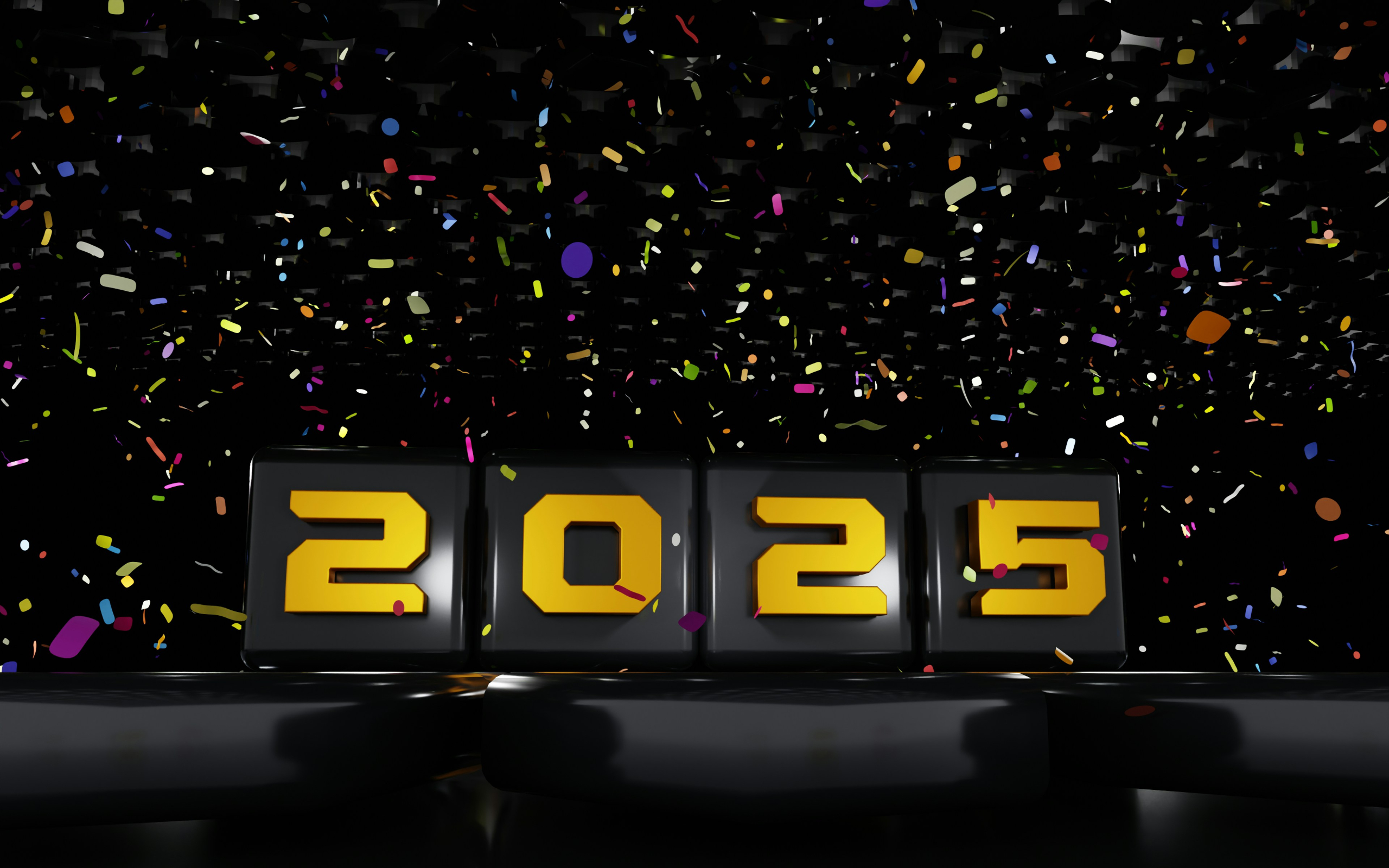 Gold 2025 numbers in front of a colorful confetti background