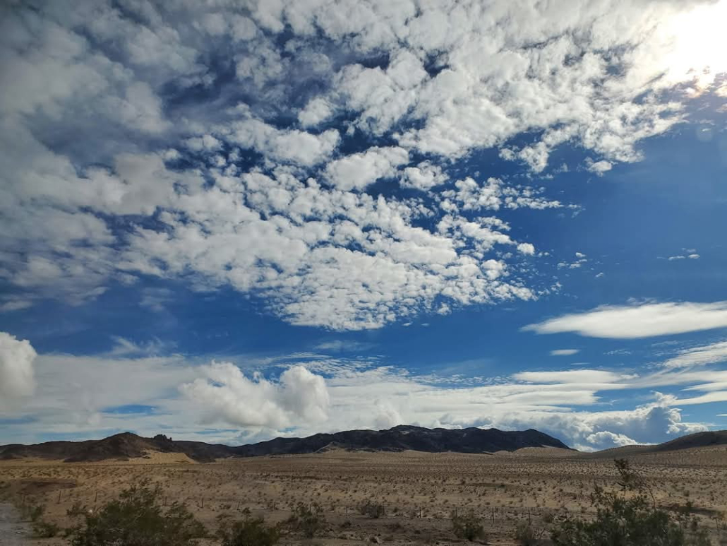 Clouds scattered across blue skies over the back roads from Las Vegas to Palm Springs