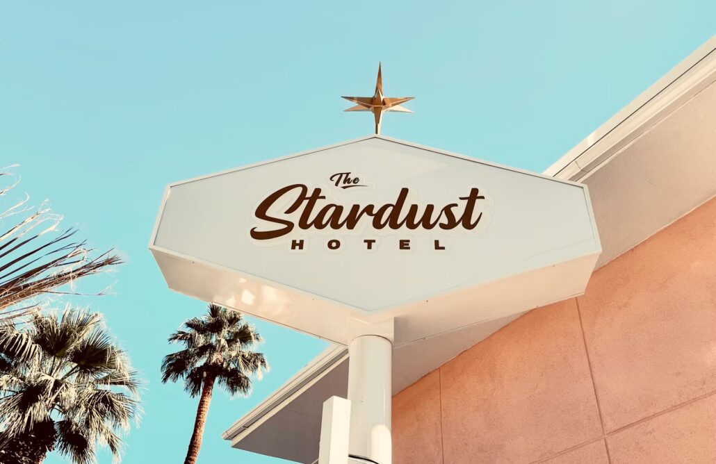 The Stardust Hotel's sign outside of the pink hotel in Palm Springs