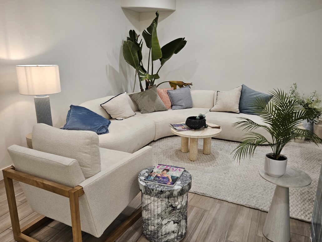A couch and tables at Casa Palma lobby
