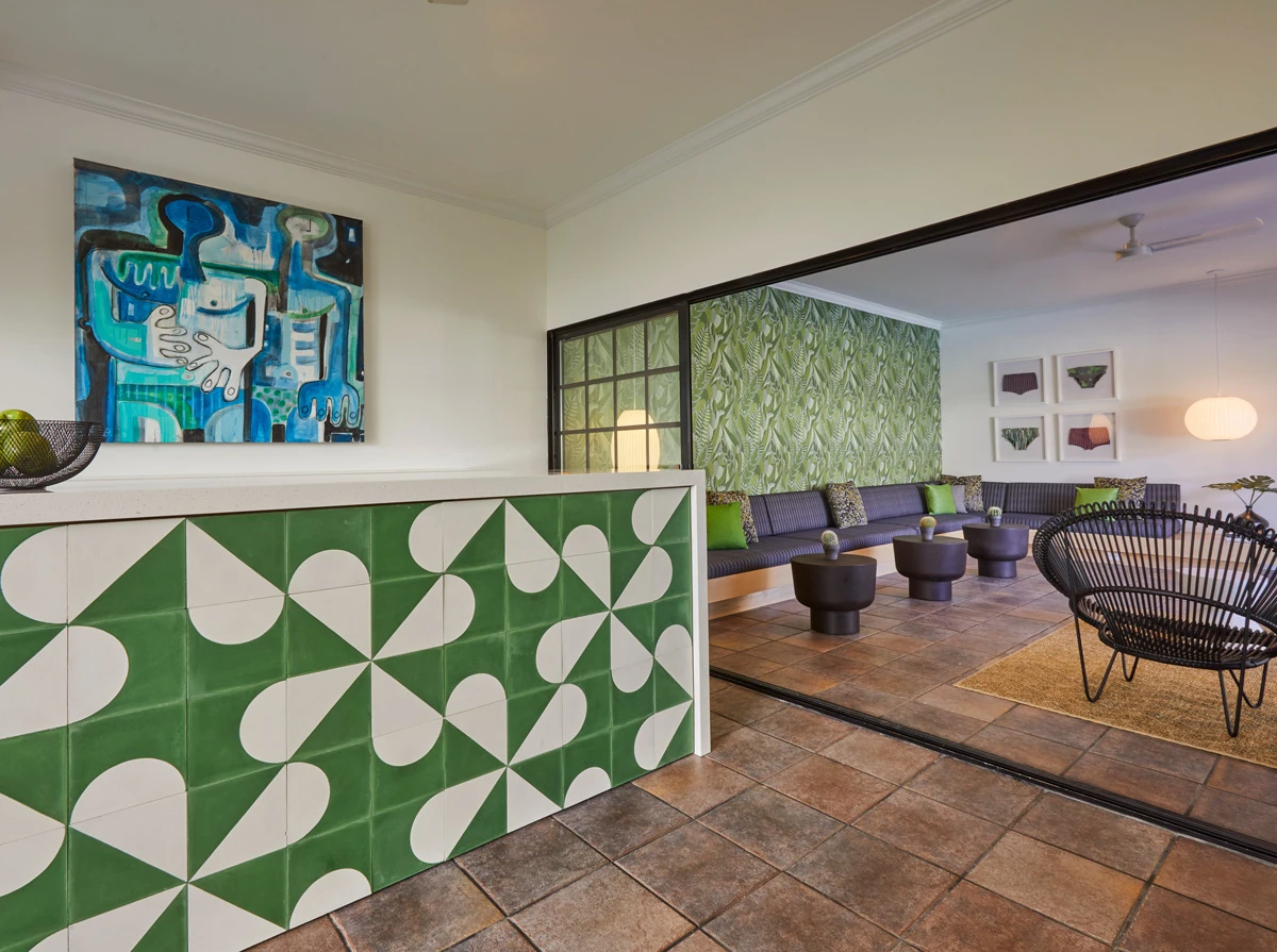 The front desk at Descanso Resort in Palm Springs, California, is made of green and white tile