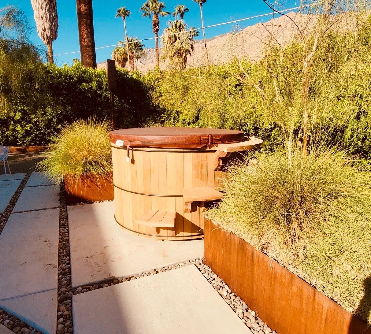 The outdoor hot tub on the grounds of The Tree Ten Hotel in Palm Springs, California