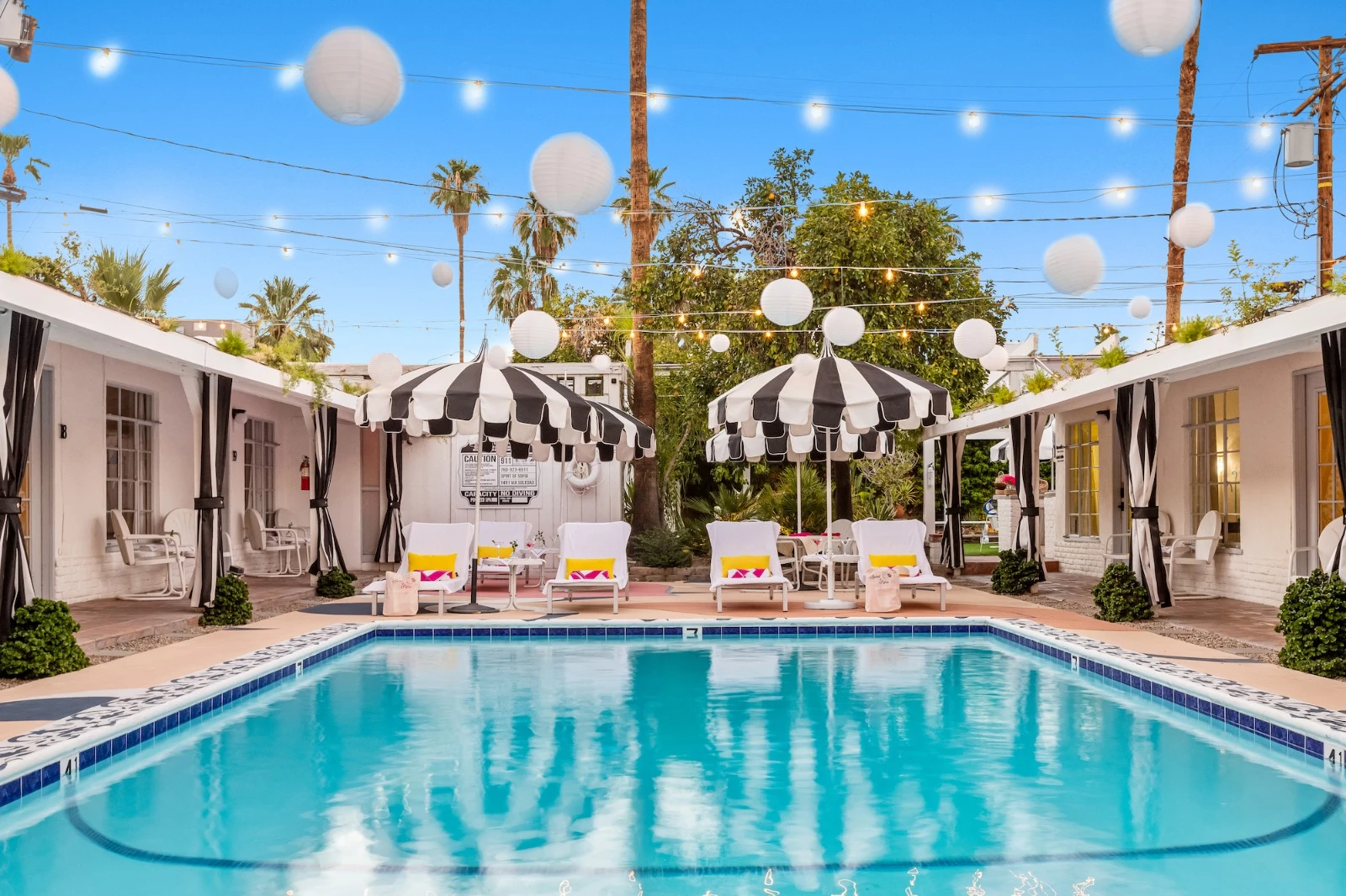 Strings of white lights above the pool at the Spirit of Sofia boutique hotel in Palm Springs, California