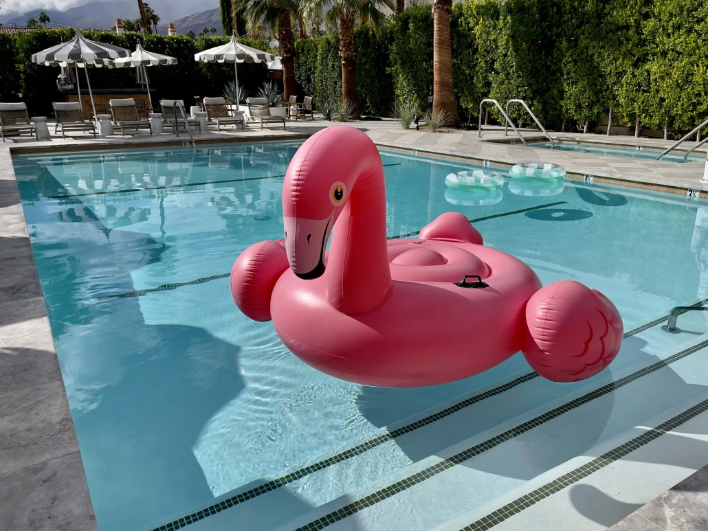 A pink flamingo float in the pool at Azure Sky in Palm Springs, California