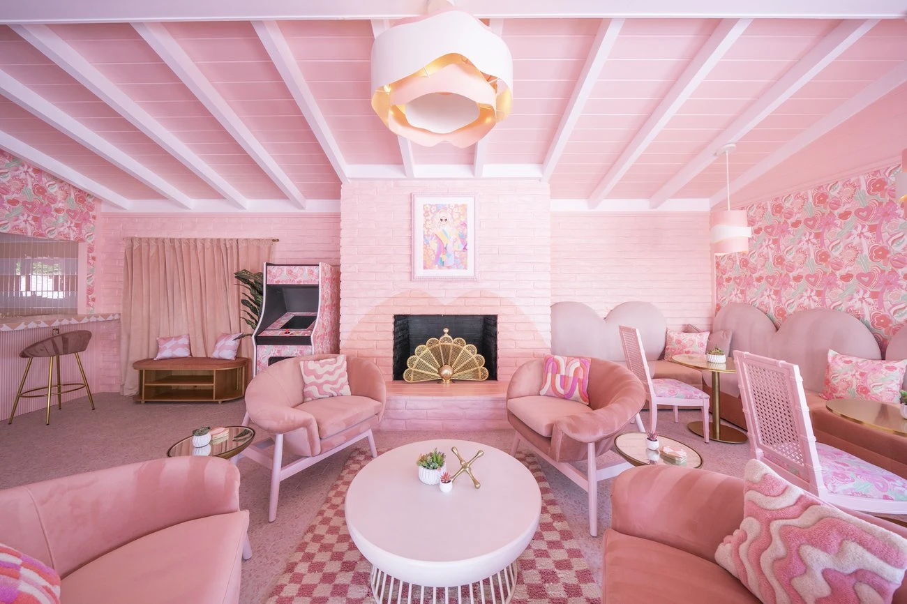 The lobby at the Trixie Motel is painted pink with pink furniture to match