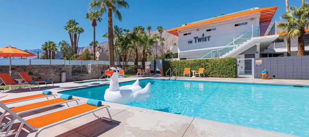 A white swan float in the pool at The Twist Palm Springs boutique hotel