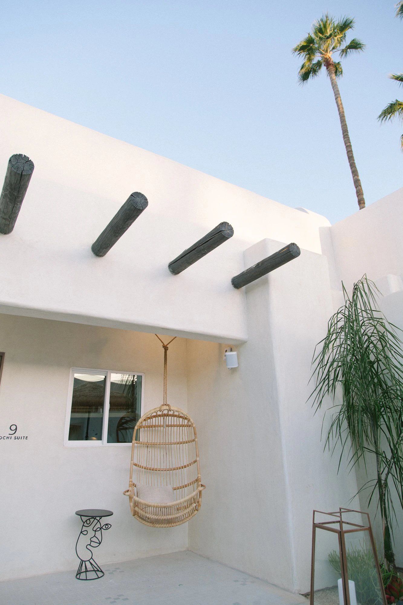 Wooden beams emerge from a building at Yara Hotel in Palm Springs California