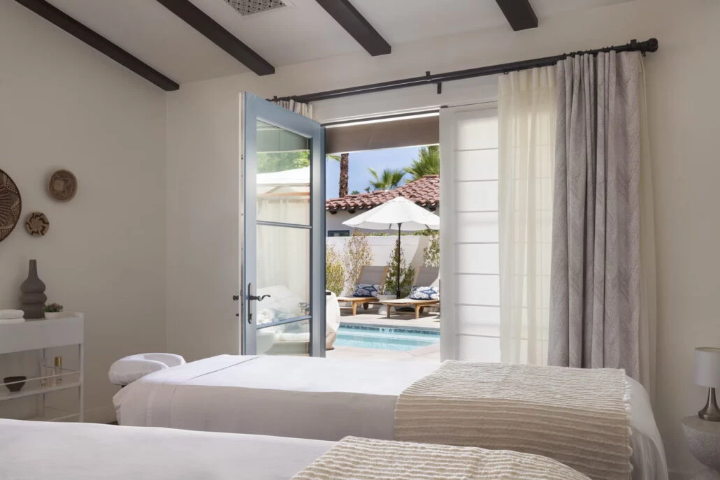 The treatment room at Spa Serena with the door open to the pool area