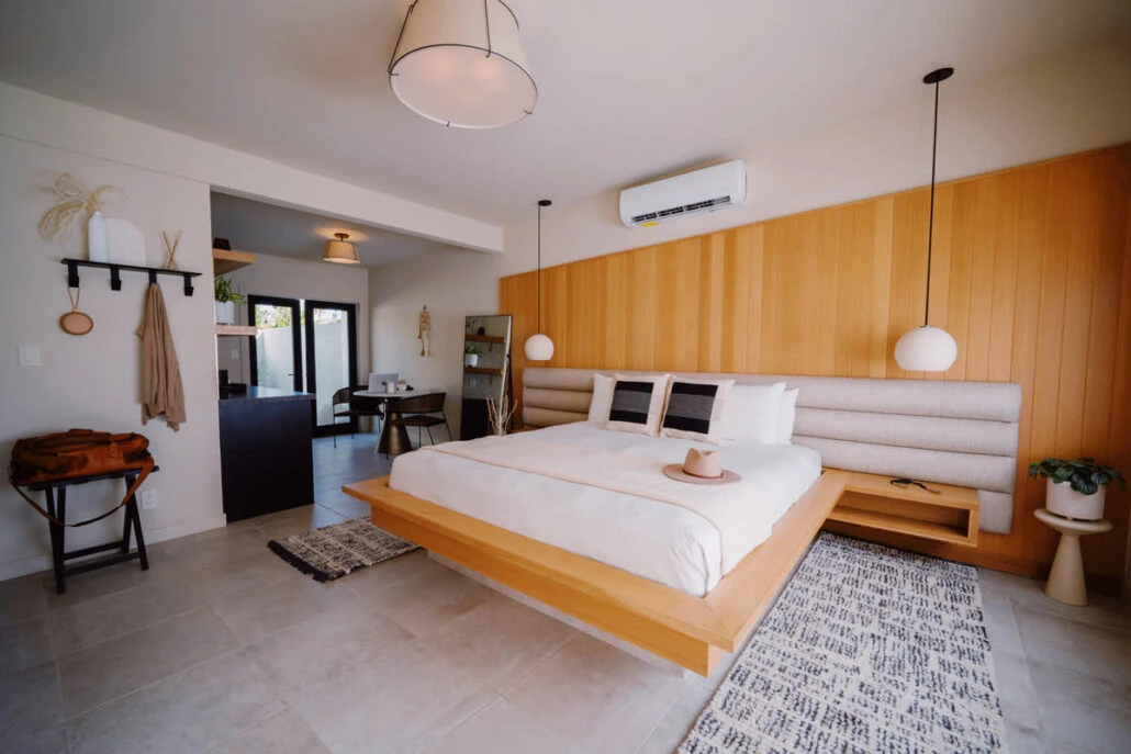 A bed inside a large room at Azure Sky Hotel in Palm Springs, California